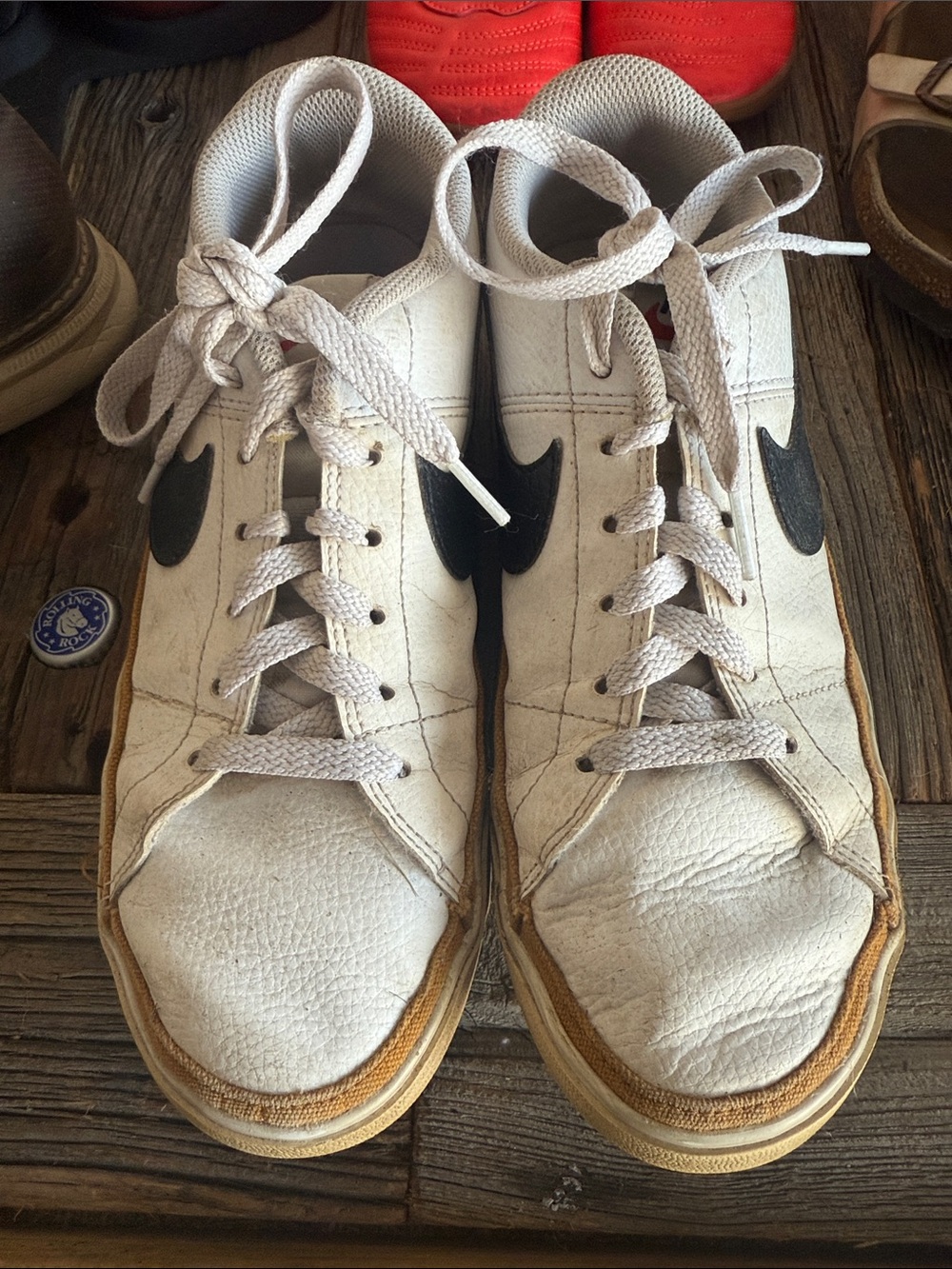 Nike White Sneakers with Black Swoosh and Tan Sole